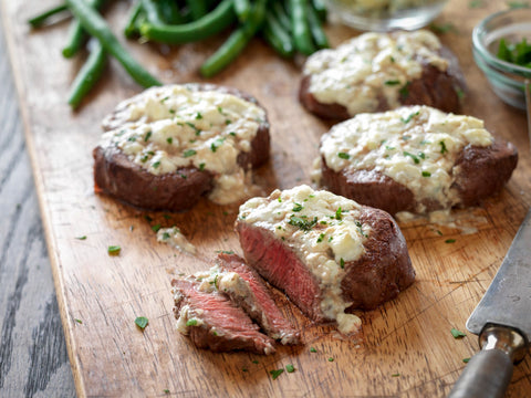 Beef tenderloin steaks with blue cheese topping